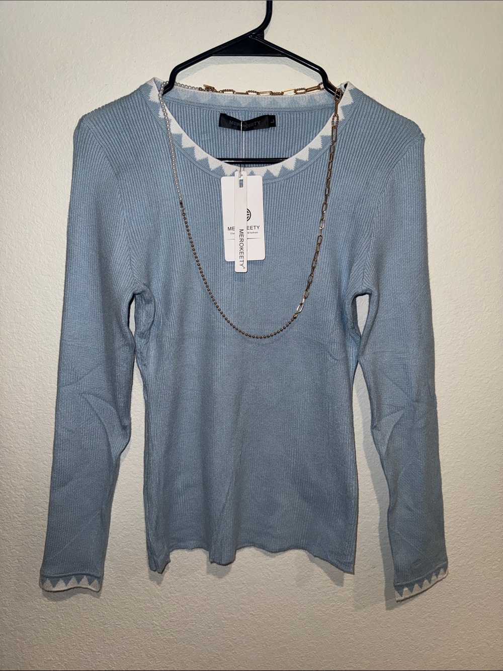 Large Merokeety Light Blue Knit Long Sleeve Sweater & gold pearl necklace